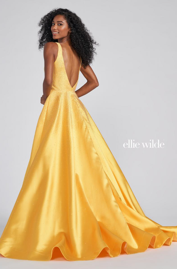A-line silhouette with a plunging V-neck neckline by Ellie Wilde